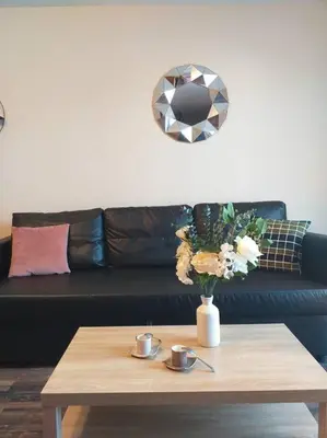 Coin salon dans l'établissement Le Saphir - Appartement et terrasse