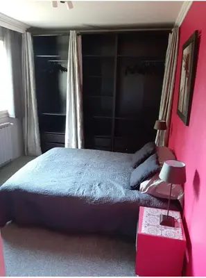 Un ou plusieurs lits dans un hébergement de l'établissement Maison confort et repos
