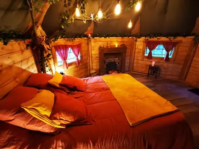 Un ou plusieurs lits dans un hébergement de l'établissement La cabane du Nuton Ardennais