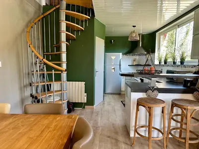 Cuisine ou kitchenette dans l'établissement Le Petit Chateau