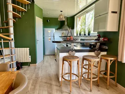 Cuisine ou kitchenette dans l'établissement Le Petit Chateau