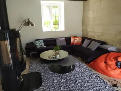 Coin salon dans l'établissement Charmante maison dans village
