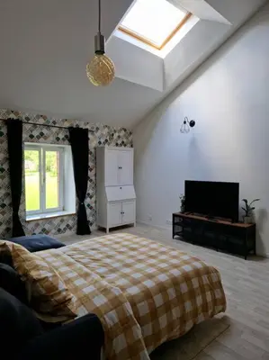 Un ou plusieurs lits dans un hébergement de l'établissement Gîte de l'étoile, 6 pers. spacieux avec extérieur