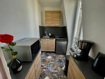Cuisine ou kitchenette dans l'établissement Champagne Cocooning