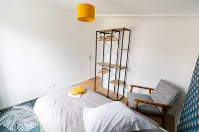 Un ou plusieurs lits dans un hébergement de l'établissement Gîte d'Artagnan 3 chambres
