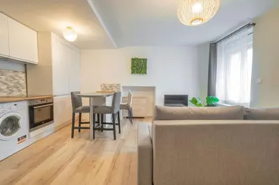 Cuisine ou kitchenette dans l'établissement Triplex cosy