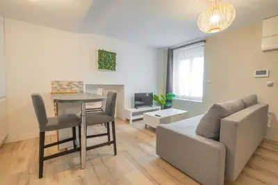 Coin salon dans l'établissement Triplex cosy