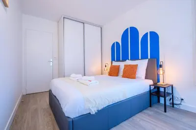 Un ou plusieurs lits dans un hébergement de l'établissement Blue Paradise