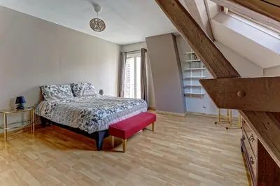 Un ou plusieurs lits dans un hébergement de l'établissement Villa Jeannot - Maison avec jardin