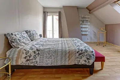 Un ou plusieurs lits dans un hébergement de l'établissement Villa Jeannot - Maison avec jardin