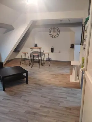 Coin salon dans l'établissement Superbe loft neuf - 1 chambre- face au Château - RIMBAUD