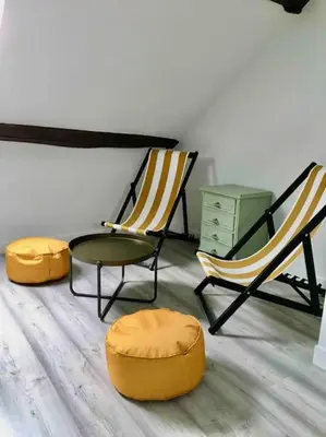 Coin salon dans l'établissement Charmant havre de paix à la campagne