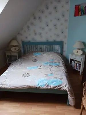 Un ou plusieurs lits dans un hébergement de l'établissement Chambres d'hôtes chez particulier