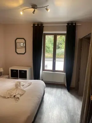 Un ou plusieurs lits dans un hébergement de l'établissement Superbe appartement face au Château - 2 chambres 5 pers - VERLAINE