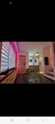 Télévision ou salle de divertissement dans l'établissement Romantique room
