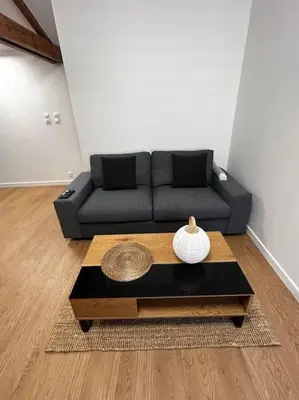 Coin salon dans l'établissement Studio cosy rémois
