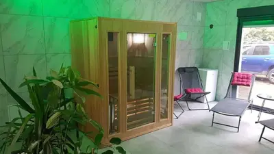 Coin salon dans l'établissement Maisonnette privatisée