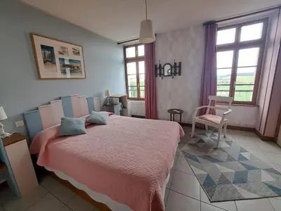 Un ou plusieurs lits dans un hébergement de l'établissement LOCATION à COUCY LE CHATEAU