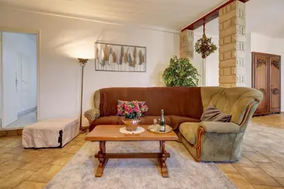 Coin salon dans l'établissement Le Relais Champenois