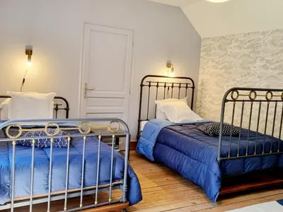 Un ou plusieurs lits dans un hébergement de l'établissement Maison indépendante en lisière de bois avec cheminée, vélos et animaux acceptés - FR-1-532-20