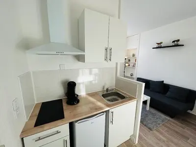 Cuisine ou kitchenette dans l'établissement La Suite Ruinart Centre-ville