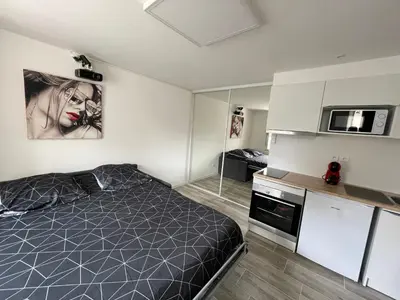 Un ou plusieurs lits dans un hébergement de l'établissement Studio Love Room spa 2 places et cinéma