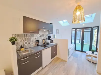 Cuisine ou kitchenette dans l'établissement Maputo - Appartement climatisé