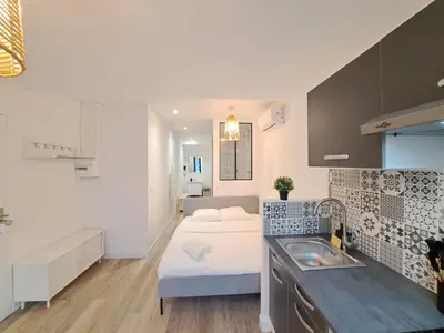 Un ou plusieurs lits dans un hébergement de l'établissement Maputo - Appartement climatisé