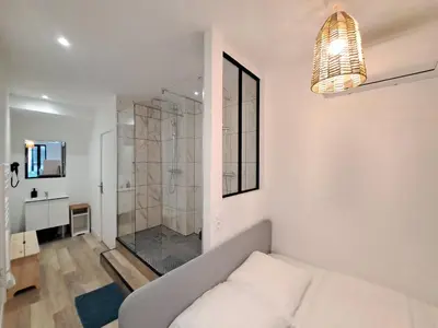 Un ou plusieurs lits dans un hébergement de l'établissement Maputo - Appartement climatisé