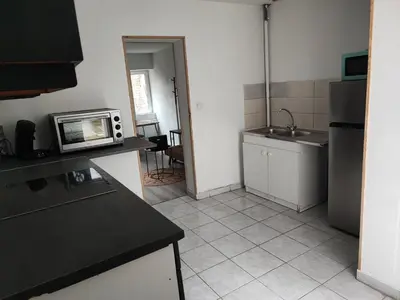 Cuisine ou kitchenette dans l'établissement Maison 2 chambres Centre-Ville
