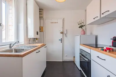 Cuisine ou kitchenette dans l'établissement 2 chambres - Centre Gare