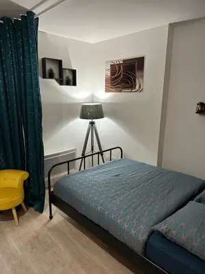 Un ou plusieurs lits dans un hébergement de l'établissement Appartement avec vue sur jardin Paris-Disney-Parking privé 'PKN MEAUX'