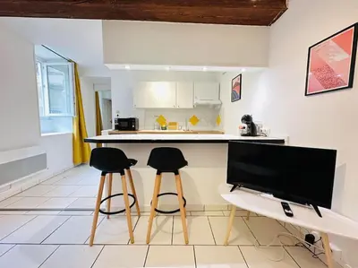 Télévision ou salle de divertissement dans l'établissement Appartement Confidentiel