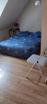 Un ou plusieurs lits dans un hébergement de l'établissement Chambres chez l habitant