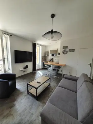 Télévision ou salle de divertissement dans l'établissement Studio de l'hôtel de ville