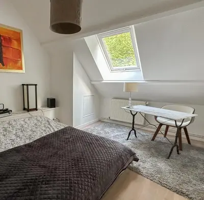 Un ou plusieurs lits dans un hébergement de l'établissement Le cottage de David