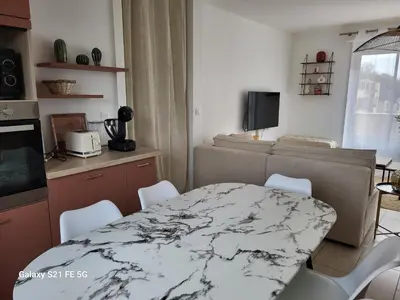 Cuisine ou kitchenette dans l'établissement Bienvenue chez ANOUK
