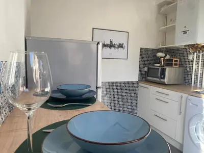 Cuisine ou kitchenette dans l'établissement Au Cosy Garden