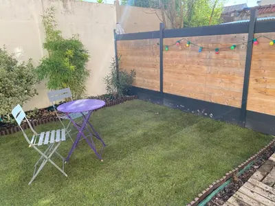 Jardin de l'établissement Au Cosy Garden
