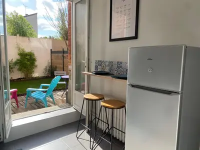 Cuisine ou kitchenette dans l'établissement Au Cosy Garden