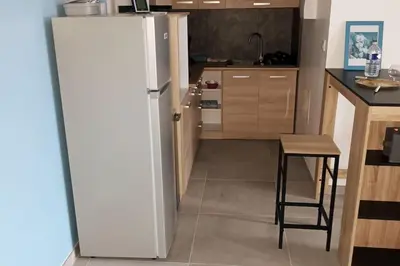 Cuisine ou kitchenette dans l'établissement Loft entier, calme, fibre et wifi