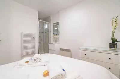 Un ou plusieurs lits dans un hébergement de l'établissement Pauline's Home Gambetta - Proche Cathédrale - Calme