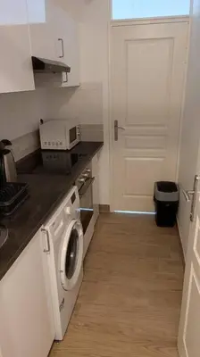Cuisine ou kitchenette dans l'établissement Appartement T2 à 35min de Paris & 20min de Disney à Saint Jean