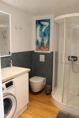 Salle de bains dans l'établissement Le Clos Voltaire