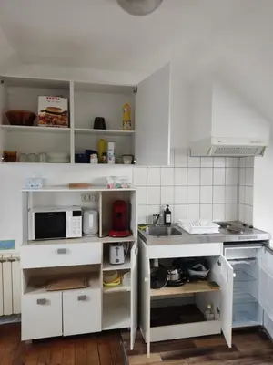 Cuisine ou kitchenette dans l'établissement Le Faubourg, proche gare et commerces