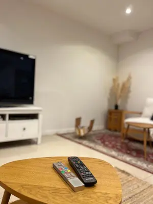 Télévision ou salle de divertissement dans l'établissement Maison Paisible à 15 min de Disneyland !
