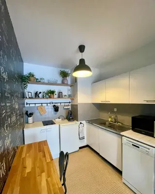 Cuisine ou kitchenette dans l'établissement Résidence de LAbbaye
