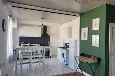 Cuisine ou kitchenette dans l'établissement La rétro- séance
