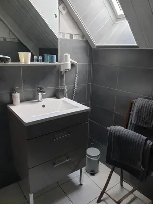 Salle de bains dans l'établissement Au Chardon Bleu