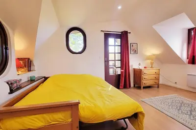 Un ou plusieurs lits dans un hébergement de l'établissement Maison de charme pour 4 personnes au calme